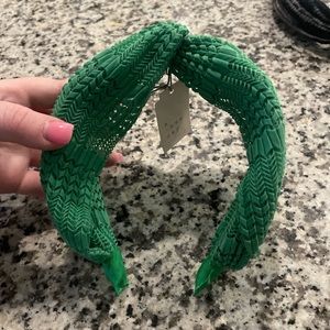 Green thicker band headband, never worn
